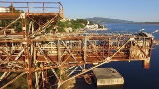 Diver Attempts Somersault Off Crane