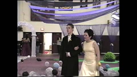 2000-01 WPHS Vids 065 Prom 031 Grand March Couple 04 by Glenn Strader