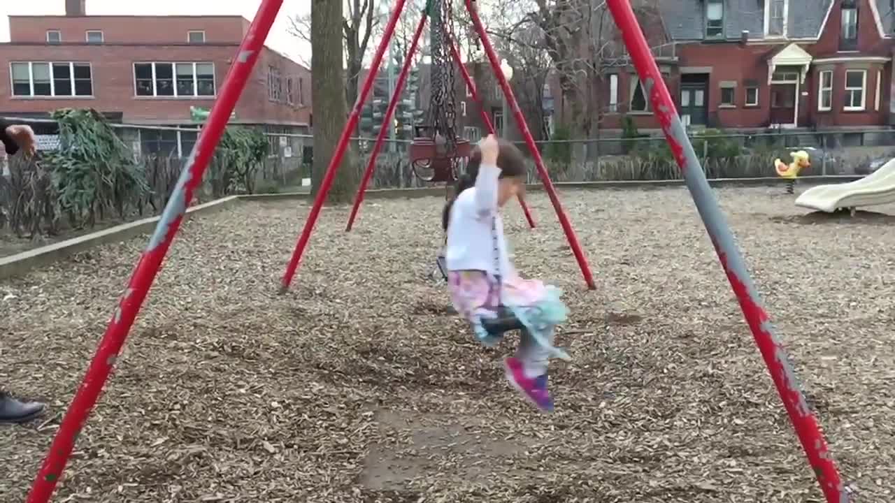 Awesome dad perfects swing stunt at the park