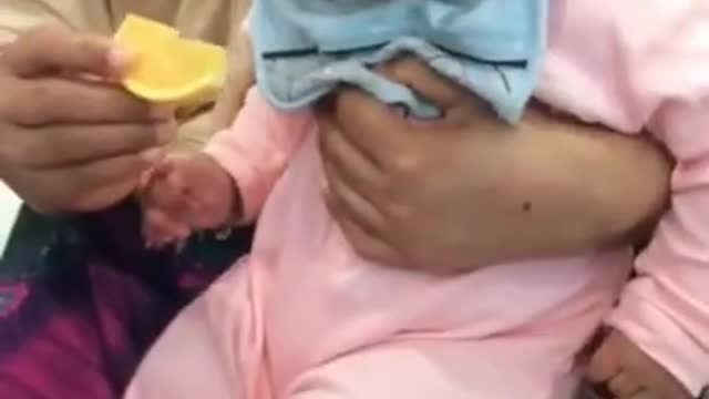 funny babies eating lemons( first time)