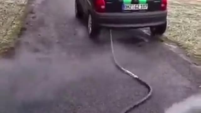 Eastern Europeans attach a hose to the back of their car