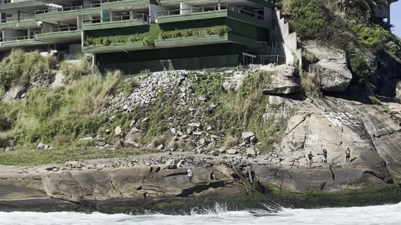 Surfers Work With Fire Department To Rescue Wrecked Speedboat