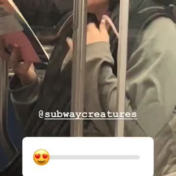 Woman reading book with rat in her scarf clothing