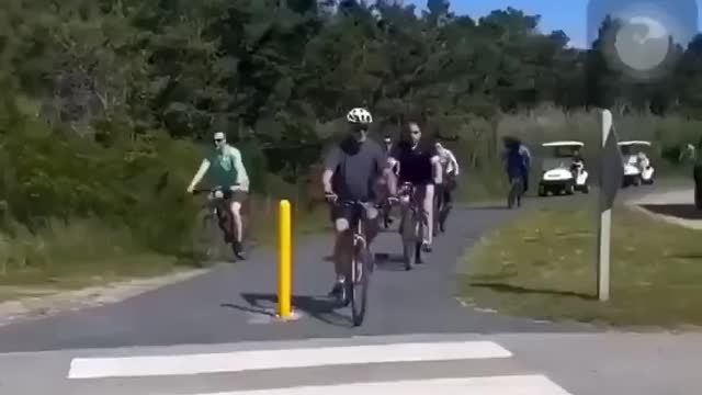 Joe Biden falling on bicycle and stairs.