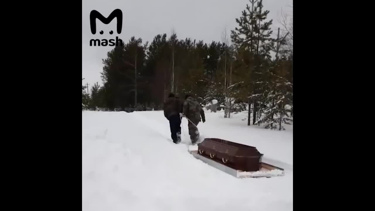 Mourners Forced To Drag Coffin On Sled Through Snow