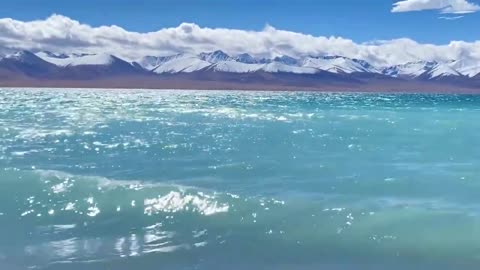 lake and snow mountain and blue sky