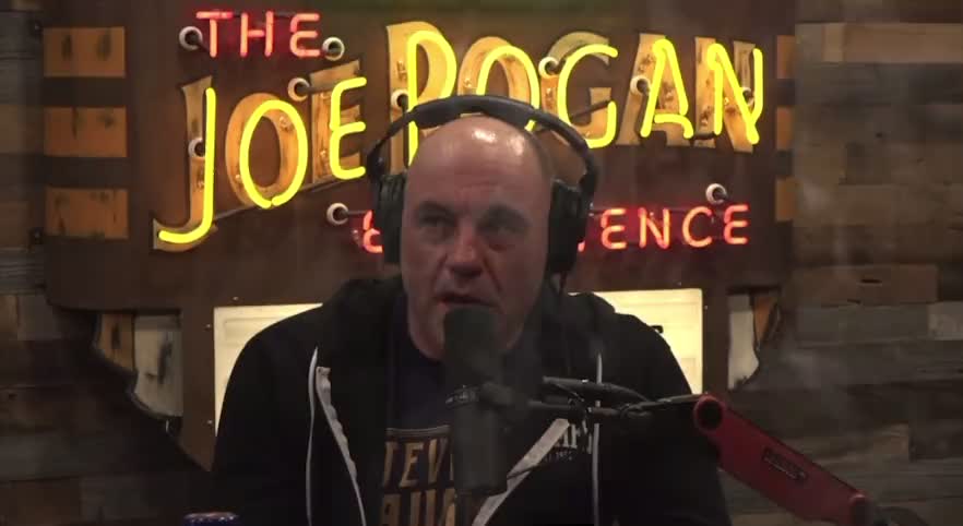 Joe Rogan ROASTS Biden: "He looks like a walking dead man!"