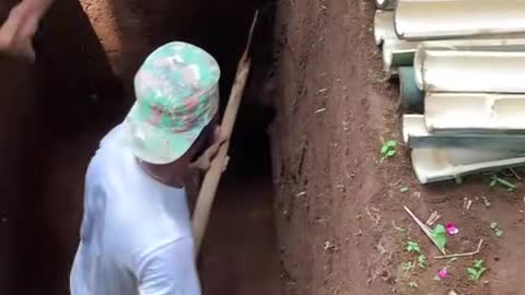 Digging graves find bodies next to them