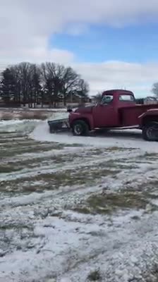 Plowing snow with a old ford truck
