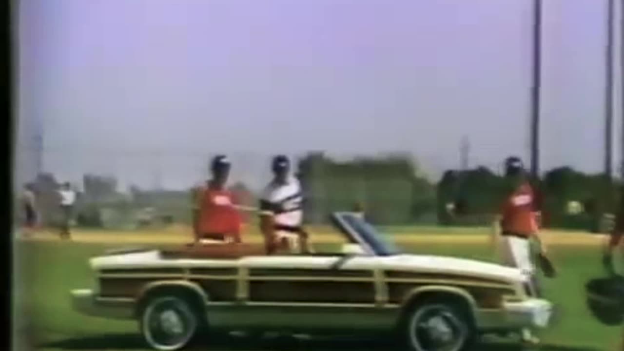 July 1983 - Ara Parseghian and The White Sox Show Off Town & Country Convertible