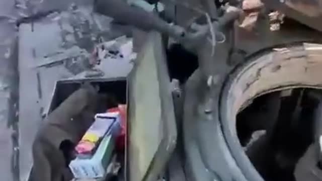 Russian tank hit with trophies somewhere in the east