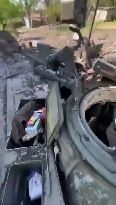 Russian tank hit with trophies somewhere in the east