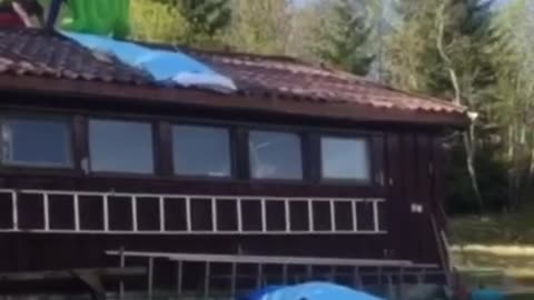 Jump from roof with inflatable turtle