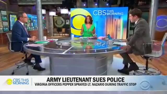 Officer speaks with U.S. Army second lieutenant Caron Nazario following Va. traffic stop