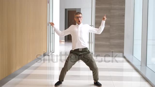 Happy Successful Businessman Dancing