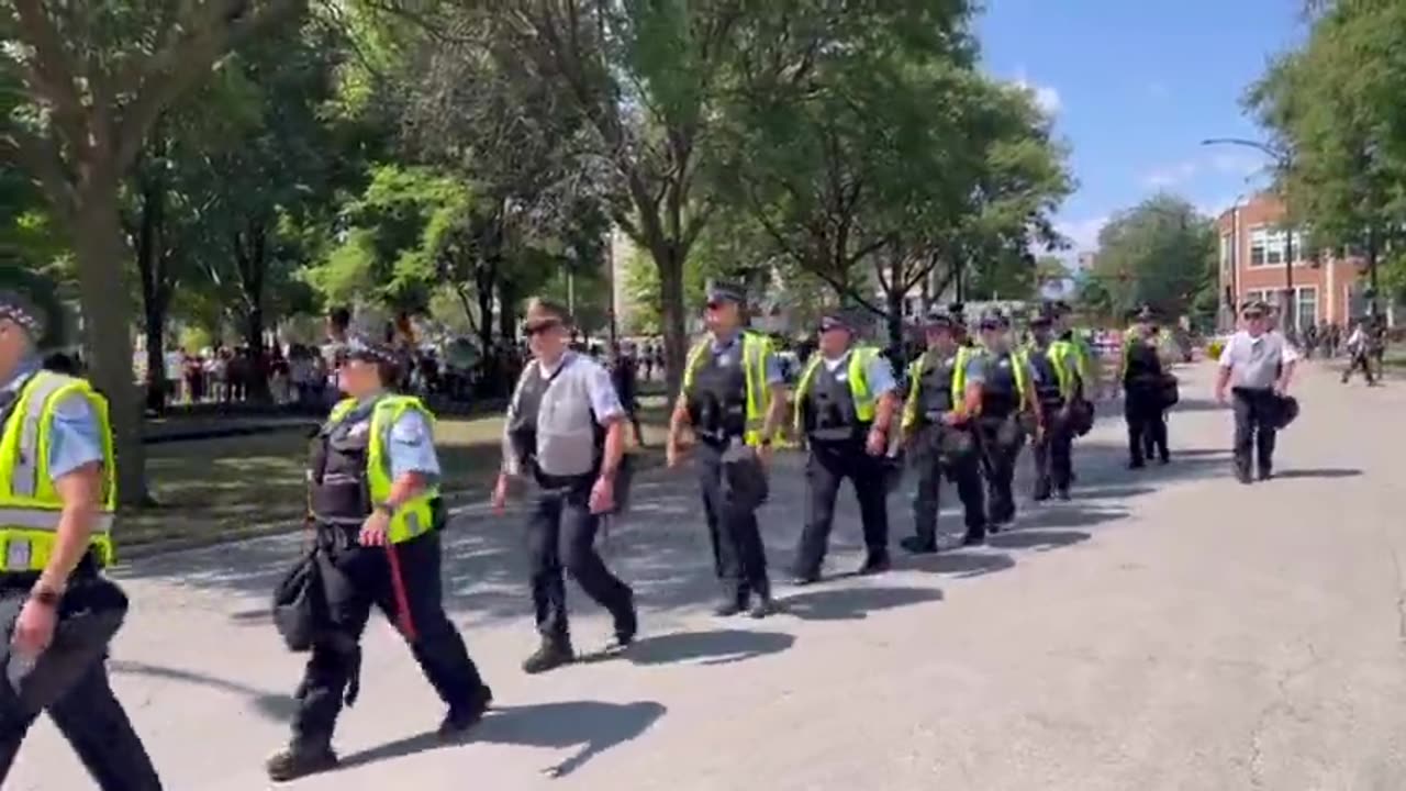 Chicago police arrive to keep Democrats in check.