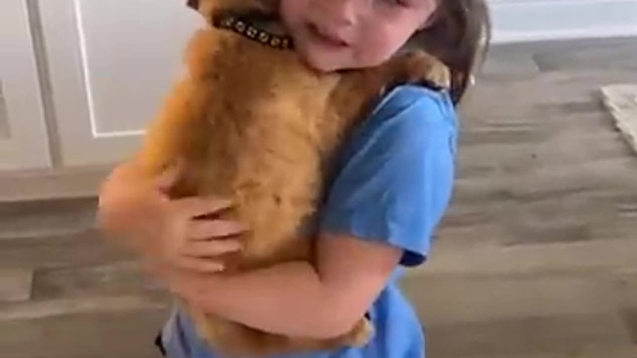 The little girl is very fond of the new puppy