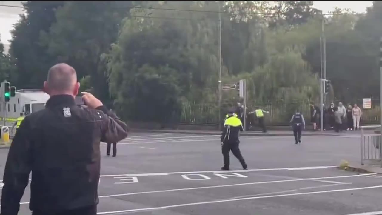 Gardai charging peaceful protesters in Coolock.