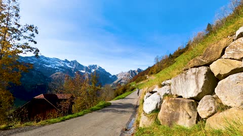 video. man walking on the mountain roads