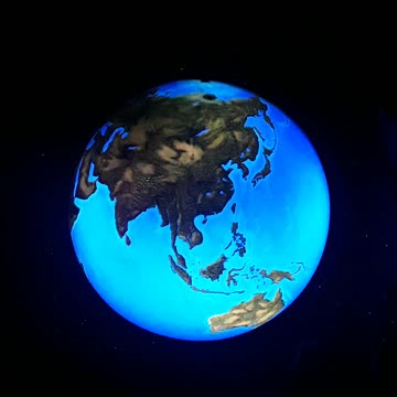 One of the first large globes made to watch at an amuzement park. 50's