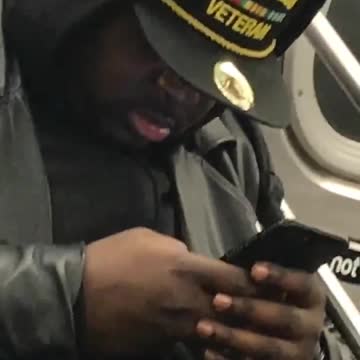 Guy with strip club veteran hat