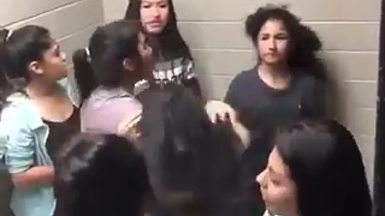 Fight video of girls fighting in bathroom.