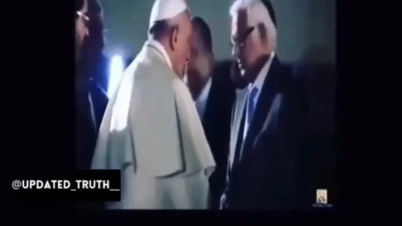 Pope kissing the hands of Luceferians!