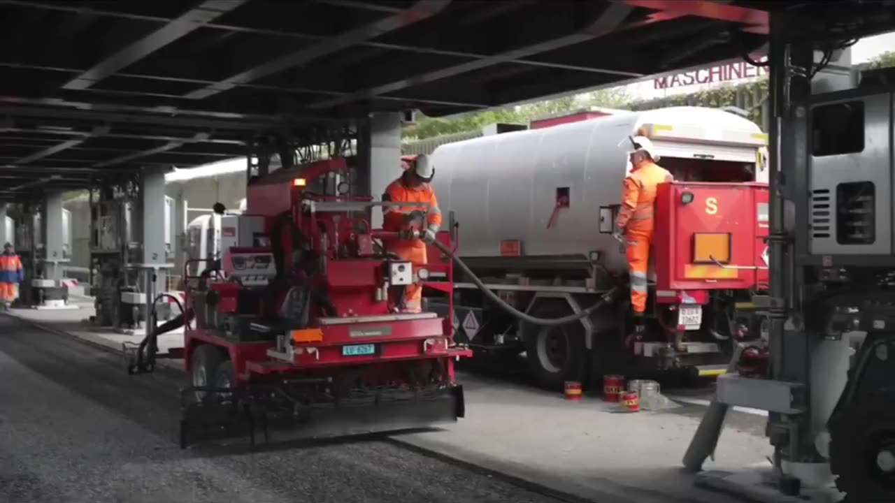 Switzerland uses a mobile overpass bridge to carry out road work without stopping traffic.