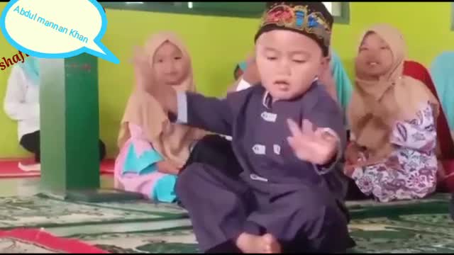 Cute boy dancing madly