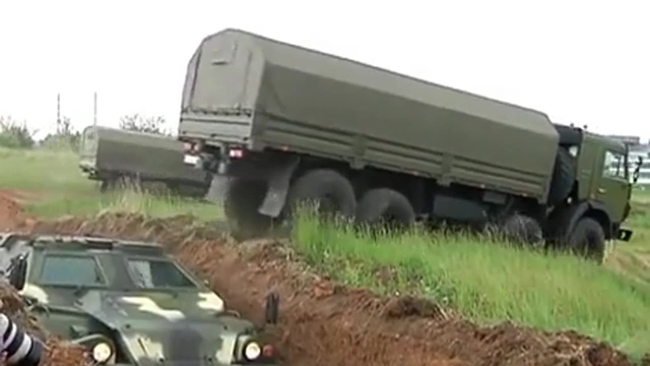 A KamAZ-6350 "Mustang" crosses the ditch over БПМ-97 "Выстрел