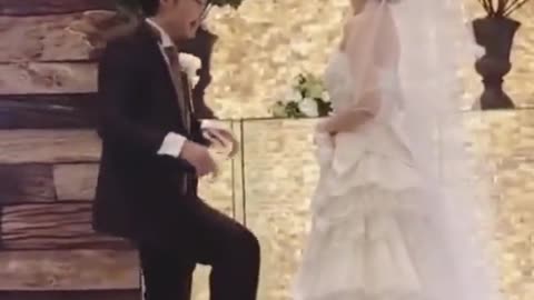 short guy funny kiss to his wife