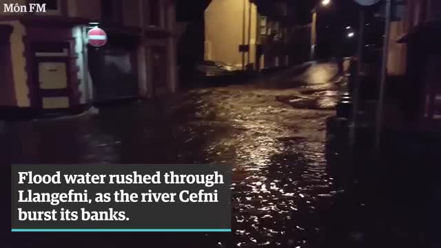 Homes and roads flood after heavy rain in Lancashire and north Wales