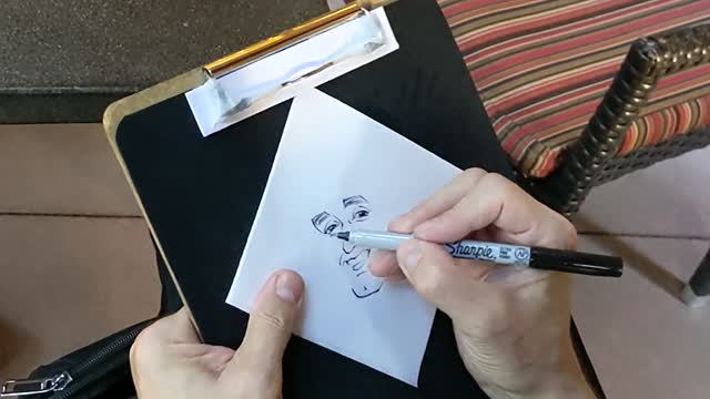 Live drawing on a cocktail napkin