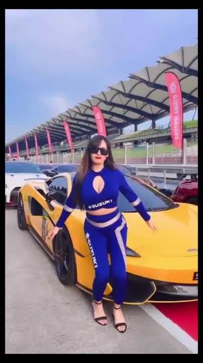 car racing,,,And the beautiful girl is presenting