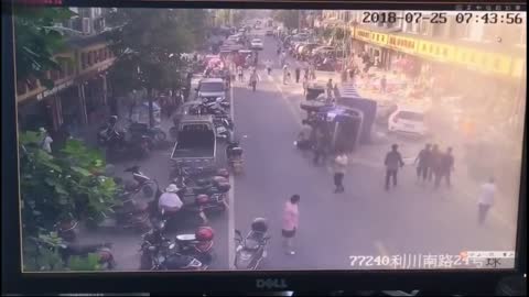 Truck loaded with 10 tons of cement accelerates out of control down busy street