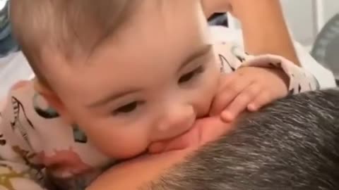 Sweet Cute baby playing with daddy.