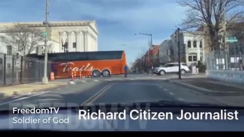 Tinted window buses coming in the backside of Capitol