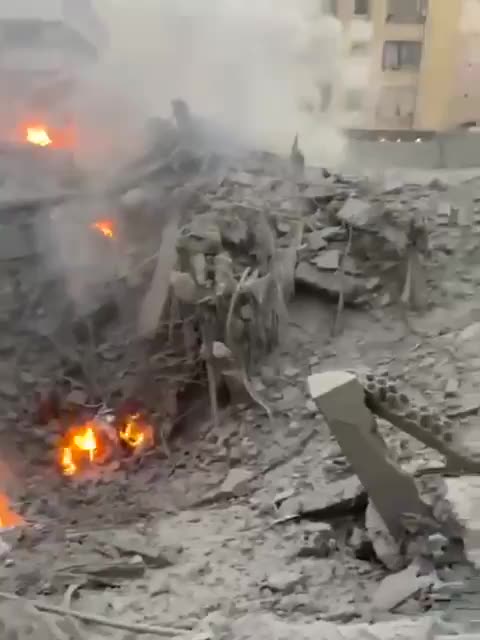 Thick Clouds of Smoke cover the Dahieh Neighborhood of Southern Beirut…
