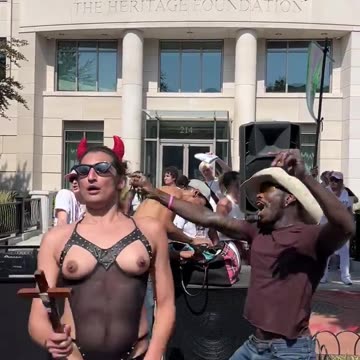 Trans Satan worshipper dancing half naked