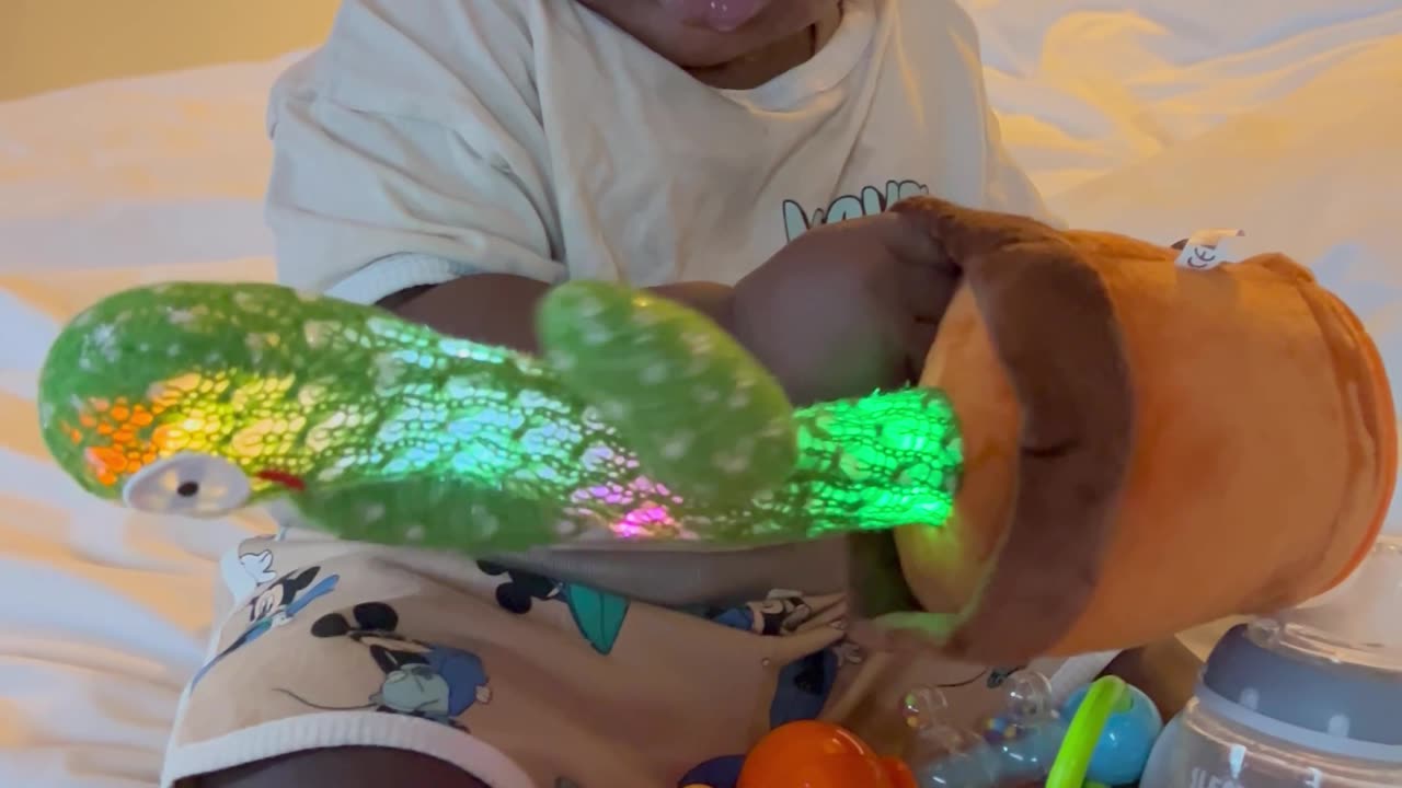 Baby Reacts to Talking Cactus Toy