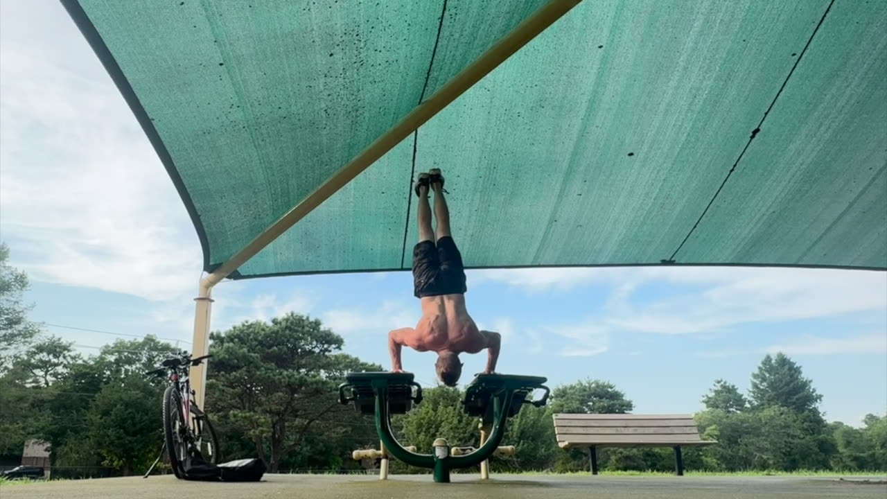 Deep Handstand Pushups on a Bike Ride Pit Stop