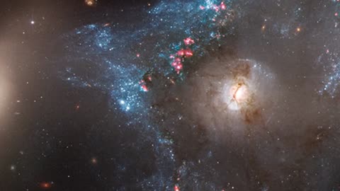 Celestial Collision Unleashes 'Space Triangle' in Hubble's Cosmic Canvas