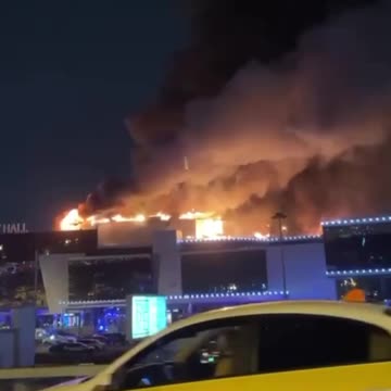 Roof Of Crocus City Hall Begins Collapsing As Blaze Continues.