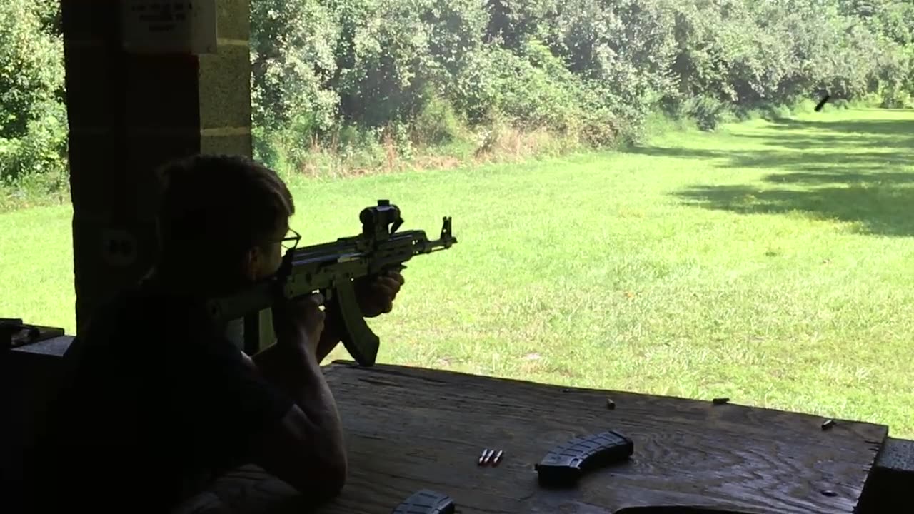 My son shooting my AK.