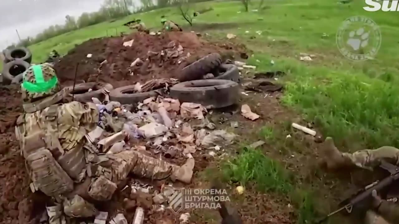 First-person body cam shows Ukrainian soldiers firing rifles from trenches of Bakhmut