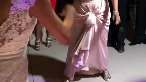 Dancing Bridesmaid Captivates Crowd