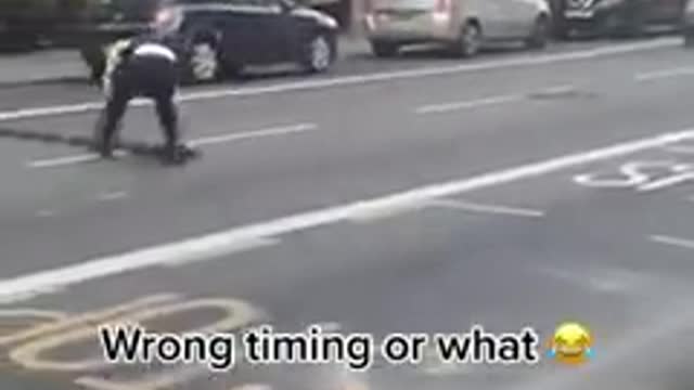 Police officer fails to lay that Spike Strip!