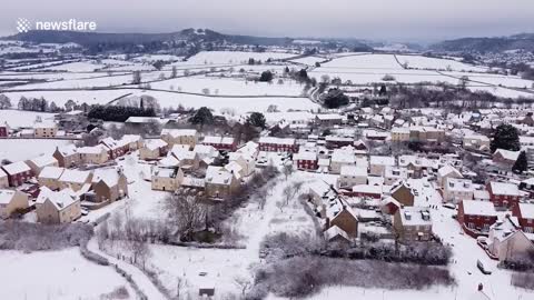 Drone footage shows beauty of English village blanketed in snow