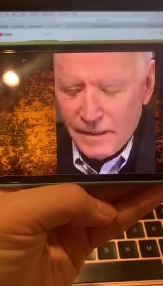 Someone is wearing a Joe Biden Mask