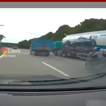 Stupid lorry driver and lucky motorcycle